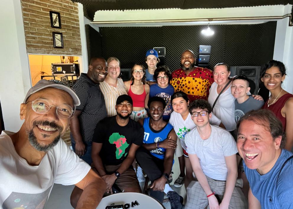 Professors Luciano Tosta and Katie Rhine (AAAS & Geography) after a percussion workshop with KU students in the Race, History, and Health Winter Break Program in Salvador, Bahia, Brazil. In the picture also Brazilian percussionists Giba Conceição and Mario Pam.