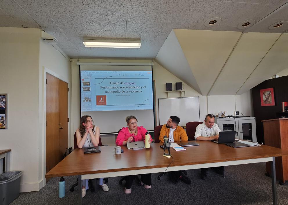 GRASP Conference Panel, 4 students at a table