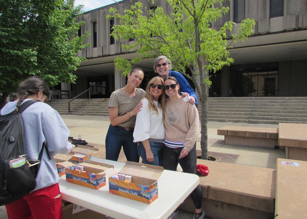 Spanish Language Program Director Amy Rossomondo with Course Coordinators Rebecca Nye, Etty Del Valle, and Jen Gabriele. Standing on wescoe beach