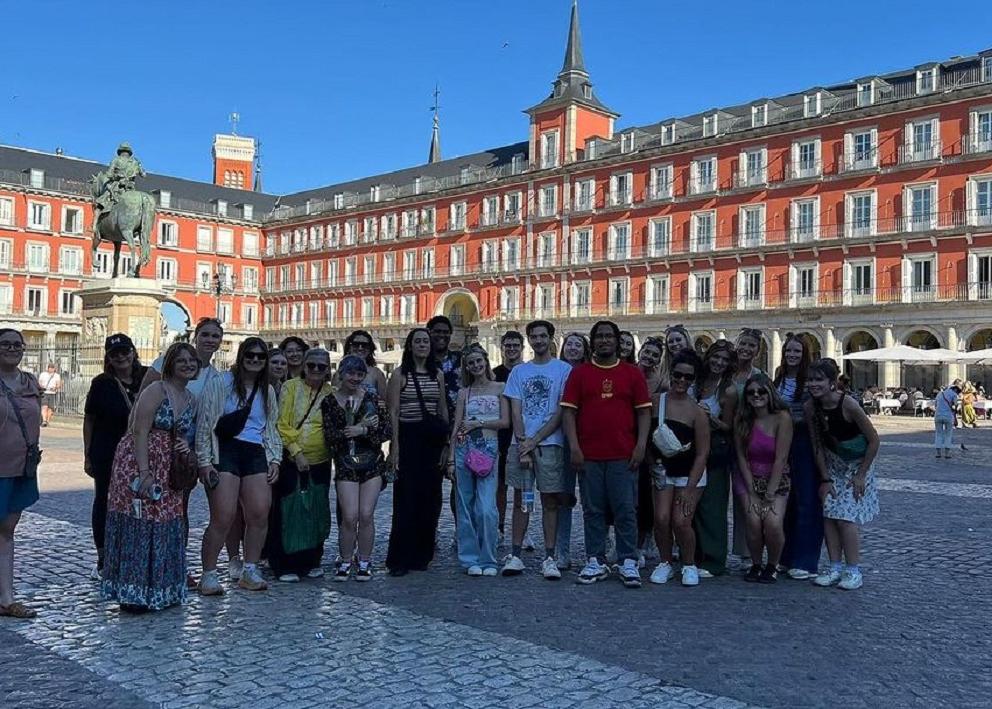 Group photo of students in plaza