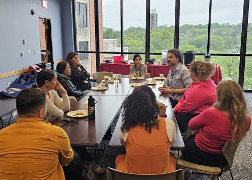 Students eating breakfast at a table