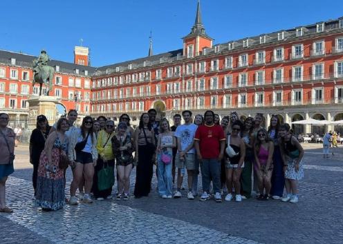 Group photo of students in plaza